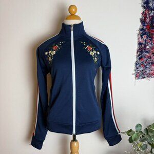 Navy blue  floral zip up track jacket with red and white striped sleeves